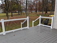 <b>TimberTech Terrain Silver Maple Deck Boards with White Washington Vinyl Railing with Black Round Aluminum Balusters in Baltimore MD 1</b>
